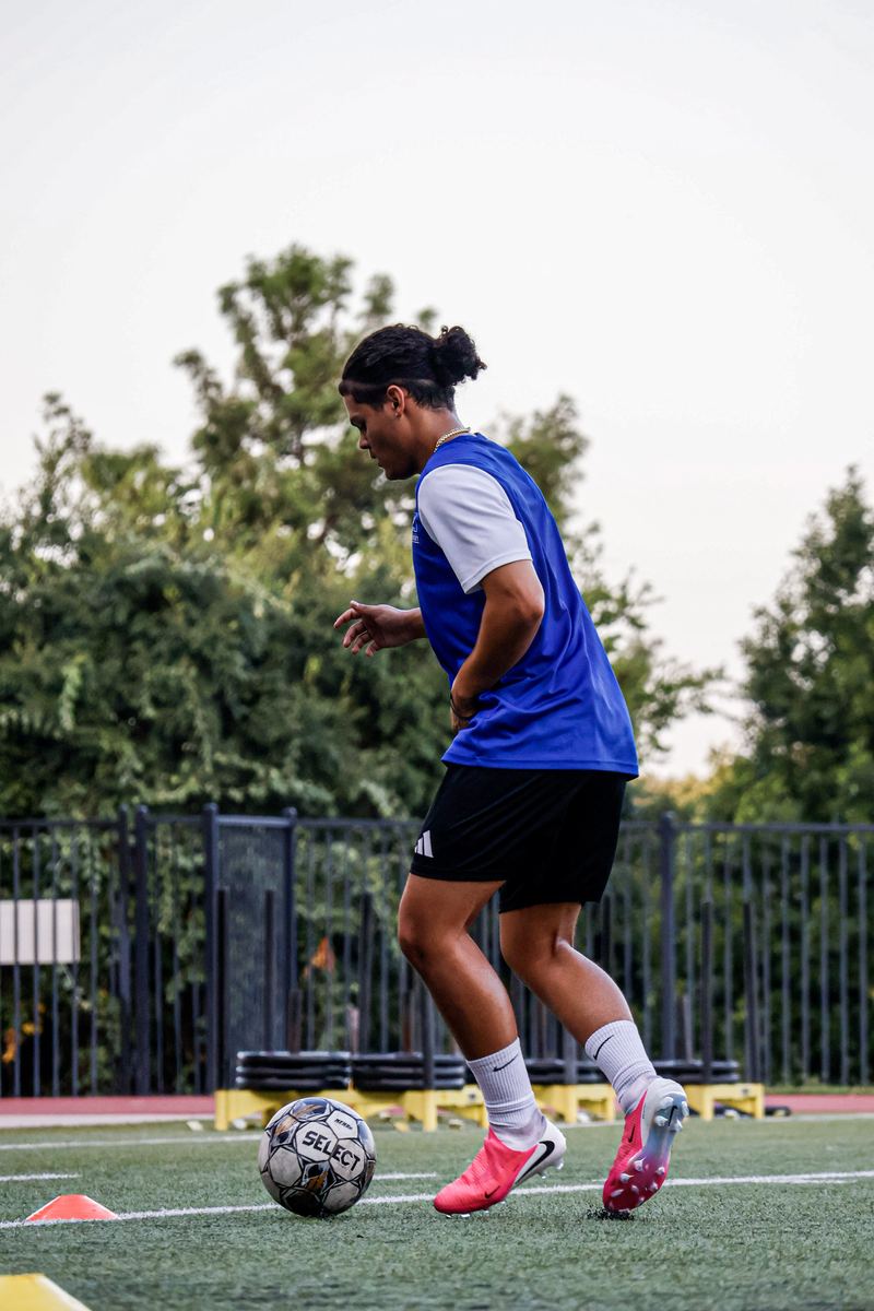 An FPA player on the ball during a technical field session.